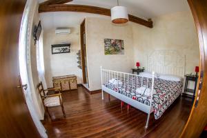 Posteľ alebo postele v izbe v ubytovaní Agriturismo Ca' Alleata + 36 fotografií