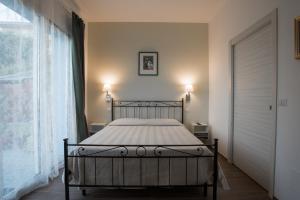 Posteľ alebo postele v izbe v ubytovaní B&B Villamarea