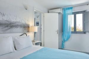 Postel nebo postele na pokoji v ubytování Villa Dakoronia + 18 fotografií