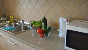 Kuchyň nebo kuchyňský kout v ubytování Apartments Krušvina