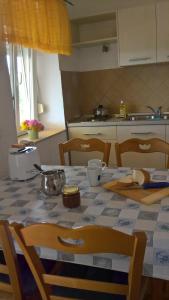 Kuchyň nebo kuchyňský kout v ubytování Apartments Krušvina