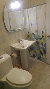 Koupelna v ubytování Hotel Gazcue