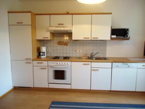 Кухня или мини-кухня в Pension Wald
