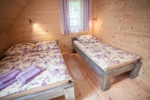 Posteľ alebo postele v izbe v ubytovaní Wiejski Zakątek nad Wigrami