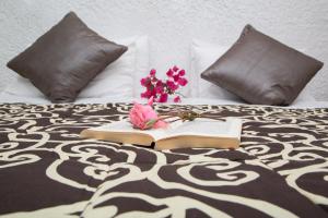 Posteľ alebo postele v izbe v ubytovaní Pantokrator Hotel