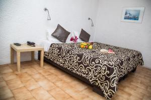 Posteľ alebo postele v izbe v ubytovaní Pantokrator Hotel