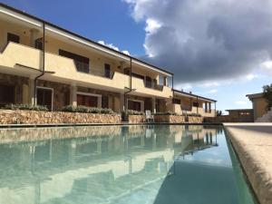 The swimming pool at or close to Le Perle