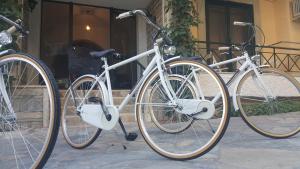 a couple of bikes parked next to each other at Enalio Rooms in Glida