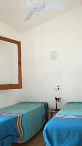 Letto o letti in una camera di Ai Tre Scalini