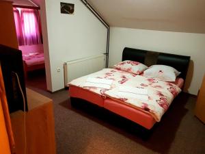 Cama o camas de una habitación en Hostel Imran Zenica