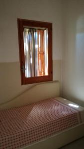 Letto o letti in una camera di Ai Tre Scalini