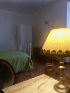 A bed or beds in a room at Renaissance Boutique House