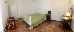 A bed or beds in a room at Renaissance Boutique House
