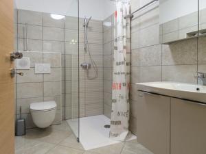 Koupelna v ubytování Apartments Reida