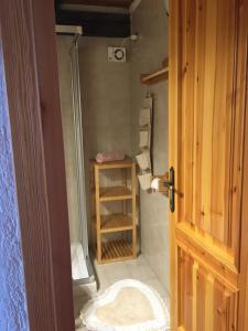 a bathroom with a shower with a toilet in it at Coeur de montagne in Gignod