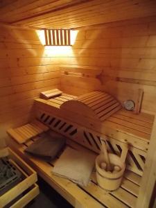 a inside of a sauna in a wooden cabin at La Vue De Château in Commercy