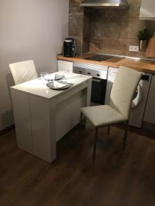 Kuchyň nebo kuchyňský kout v ubytování La Pinilla Ski Apartment