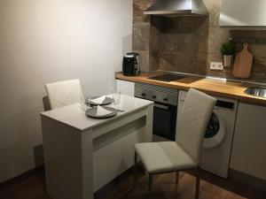 Kuchyň nebo kuchyňský kout v ubytování La Pinilla Ski Apartment