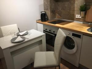 Kuchyň nebo kuchyňský kout v ubytování La Pinilla Ski Apartment