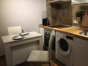 Kuchyň nebo kuchyňský kout v ubytování La Pinilla Ski Apartment