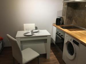 Kuchyň nebo kuchyňský kout v ubytování La Pinilla Ski Apartment