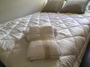 Postel nebo postele na pokoji v ubytování La Pinilla Ski Apartment