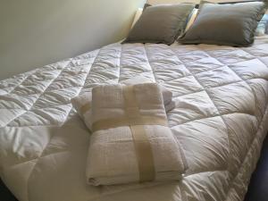 Postel nebo postele na pokoji v ubytování La Pinilla Ski Apartment