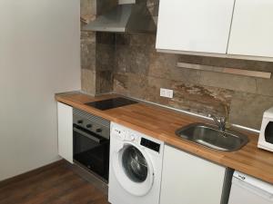 Kuchyň nebo kuchyňský kout v ubytování La Pinilla Ski Apartment