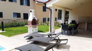 Patio nebo venkovní prostory v ubytování Villas Simag