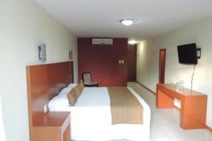 TV a/nebo společenská místnost v ubytování Hotel Central