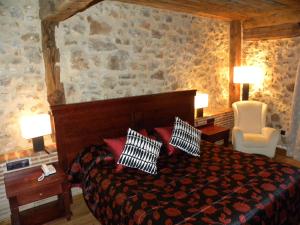 Postel nebo postele na pokoji v ubytování Posada Los Templarios
