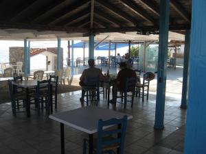 A restaurant or other place to eat at Maravelias House