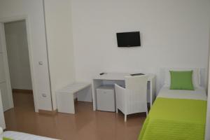 TV a/nebo společenská místnost v ubytování Bed Happy
