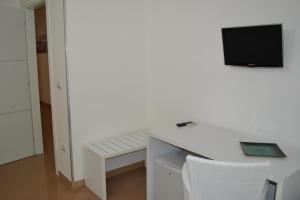 TV a/nebo společenská místnost v ubytování Bed Happy