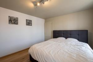 Postel nebo postele na pokoji v ubytování Sekowa-lodge