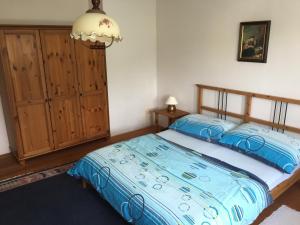 Postel nebo postele na pokoji v ubytování Apartments Huty