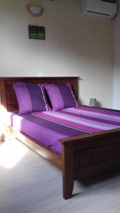 מיטה או מיטות בחדר ב-Chez Solange et Michel