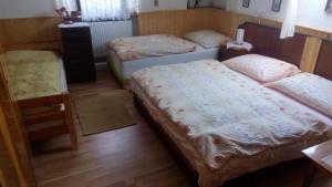 Letto o letti in una camera di U Tří Koček