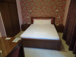 Postel nebo postele na pokoji v ubytování Plage Hotel