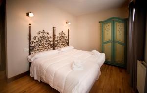 Cama o camas de una habitación en Casa Rural Maialde