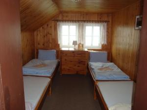 Cama o camas de una habitación en Moravská Bouda