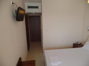 Postel nebo postele na pokoji v ubytování Plage Hotel