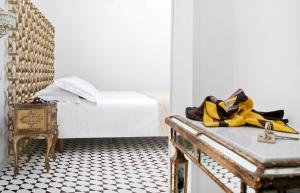 Postel nebo postele na pokoji v ubytování Villa Oriana Relais