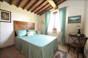 Postel nebo postele na pokoji v ubytování Podere Casalsole + 37 fotografií