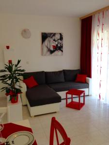 a living room with a couch and a table at Villa Jasmin in Bol