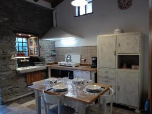 Kuchyň nebo kuchyňský kout v ubytování Casa Millin