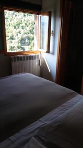 Postel nebo postele na pokoji v ubytování B&B Da Giua'