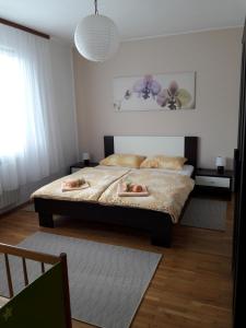 En eller flere senger på et rom på Apartments Korana, BelajskePoljice