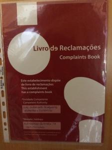 a box of linyo de rearmaments complaints book at Ericeira Surf and Sun in Ericeira