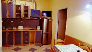 Η κουζίνα ή μικρή κουζίνα στο Apartment By The Sea